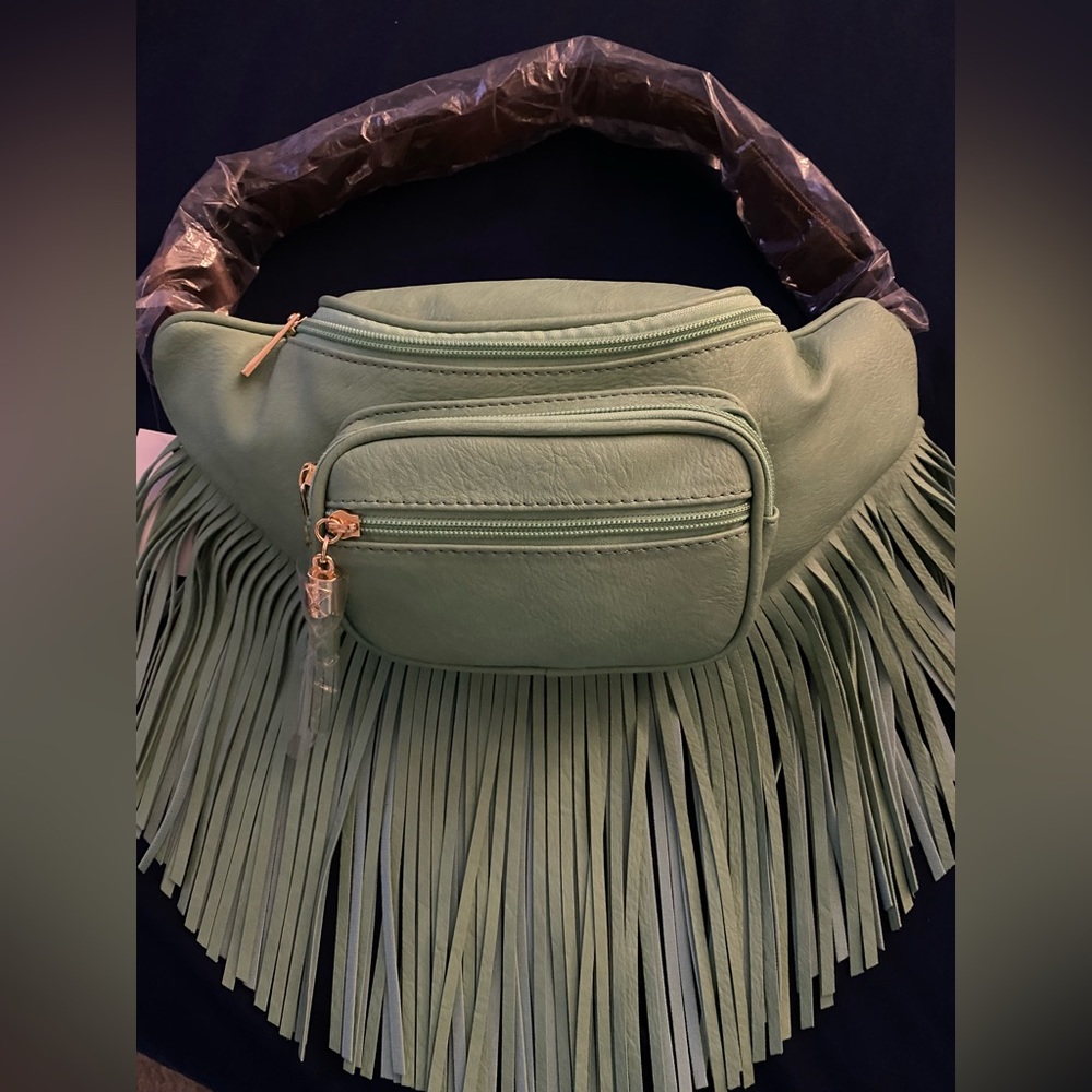 NWT Turquoise/Teal fringed faux leather strap Crossbody